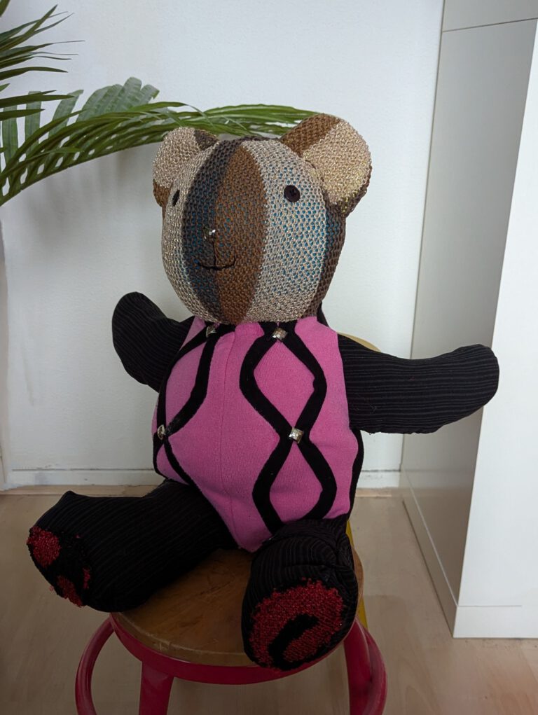 Teddy bear made from different pieces of clothing