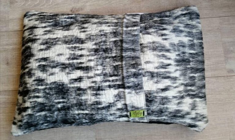 Decorative cushion made of animal fur fabric
